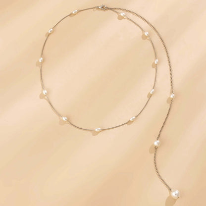 collier de dos fausses perles